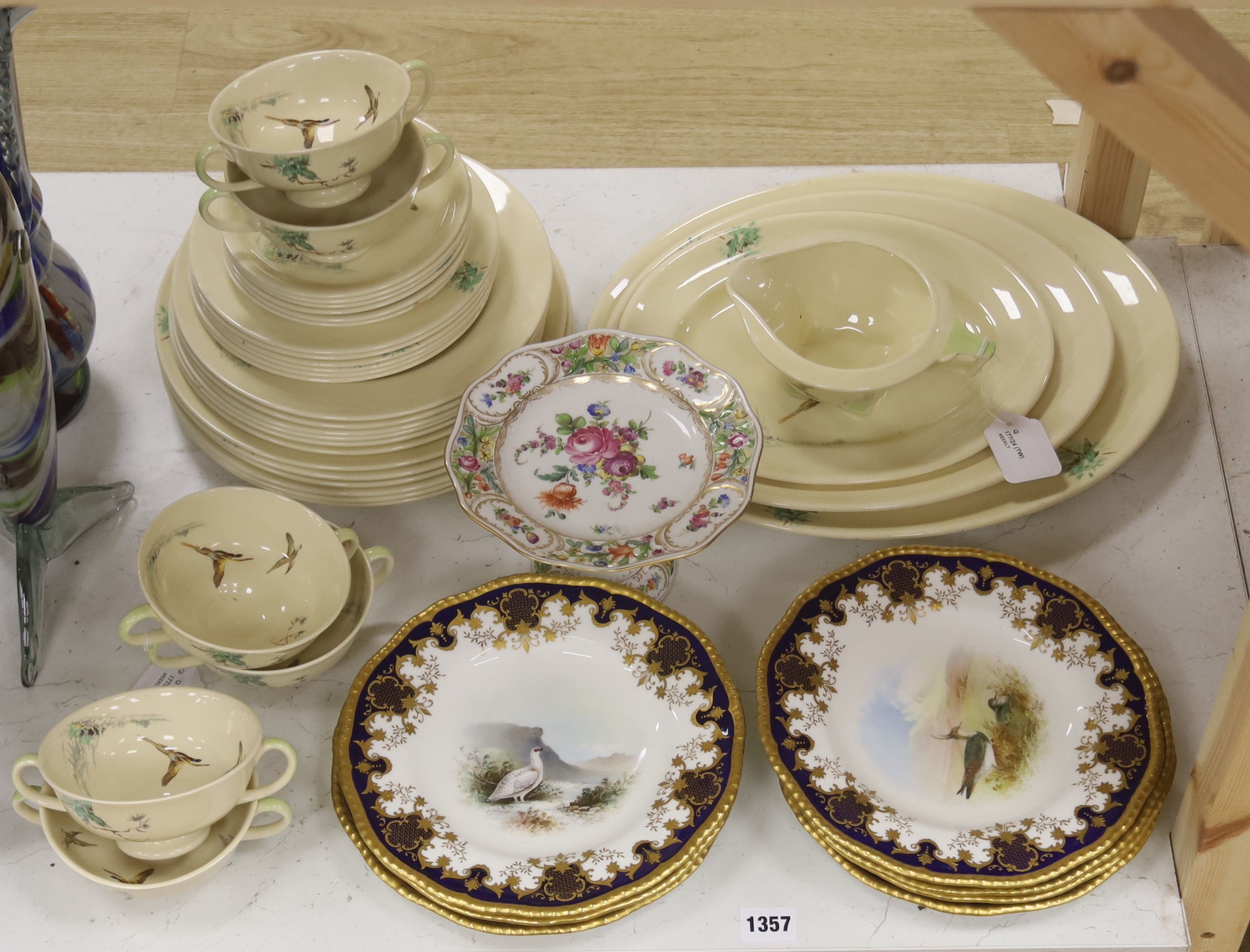 A set of six Coalport game bird plated plates and a Royal Doulton 'The Coppice' pattern part dinner service